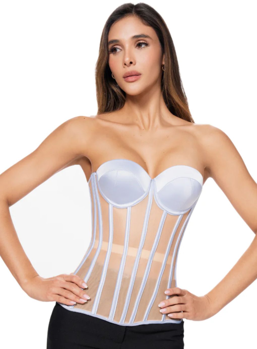 Woman wearing a pale blue corset 